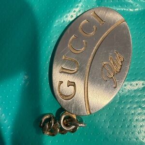 Gucci Silver and Gold Oval Pendant